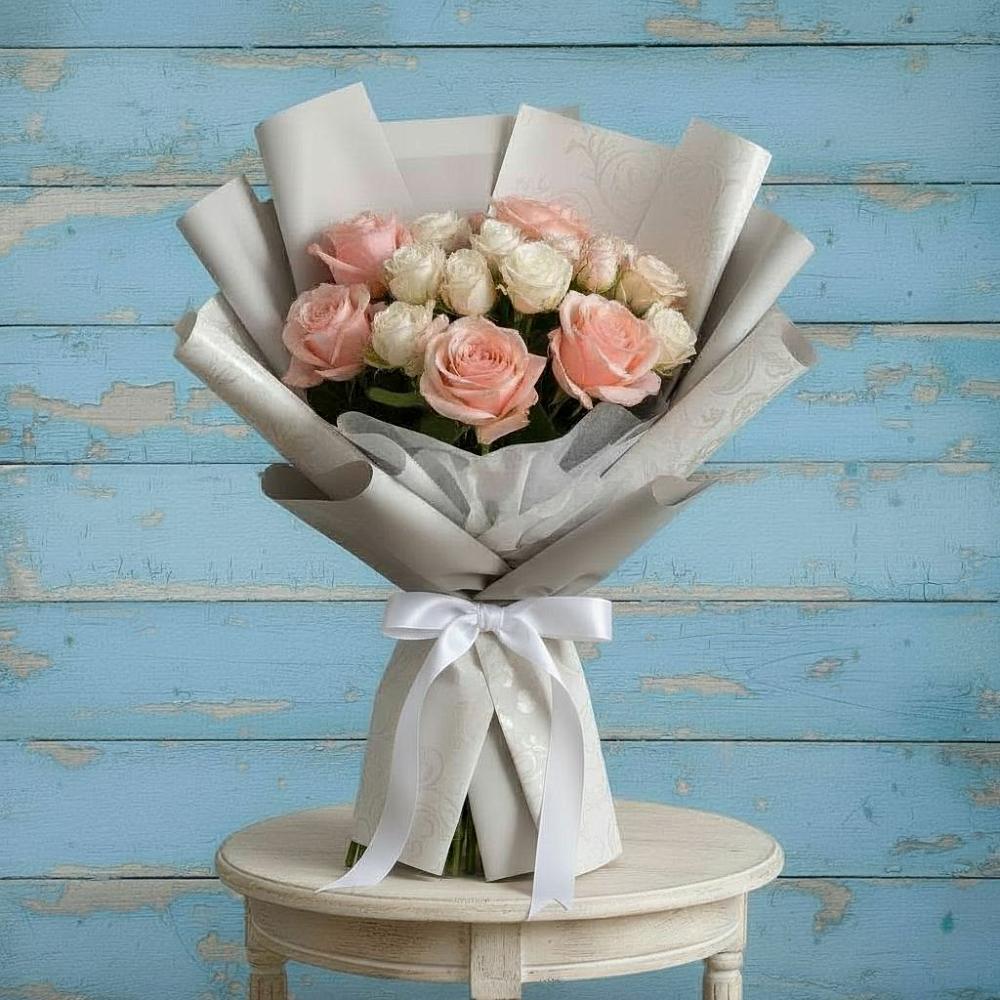 Букет цветов из: Розы в Среднем